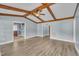 Spacious living room featuring vaulted ceilings and exposed wood beams at 105 Poplar Dr. Dr, Clayton, NC 27520