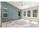Light-filled bedroom features decorative wall trim, and multiple windows for natural light at 1131 Lowland St, Apex, NC 27523