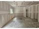 Bright, unfinished living room area with recessed lighting and natural light at 115 Mildred Place, Broadway, NC 27505