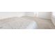 Spacious bedroom with plush carpeting and natural light at 116 Hayfield Dr, Lillington, NC 27546