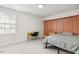 Bright bedroom features a desk and neutral color palette at 116 Hayfield Dr, Lillington, NC 27546