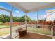 Screened patio with a view of a fenced-in backyard, combining indoor comfort with outdoor scenery at 116 Hayfield Dr, Lillington, NC 27546