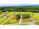 Aerial view of homes surrounded by lush green trees and well-manicured lawns at 117 Knight Rd Rd, Broadway, NC 27505