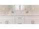 Bathroom featuring a double sink vanity with white drawers and hardware at 117 Knight Rd Rd, Broadway, NC 27505