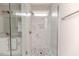 Bathroom with a glass enclosed shower, granite counters, and grey stone shower floor at 117 Knight Rd Rd, Broadway, NC 27505