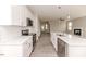 Modern kitchen featuring stainless steel appliances, island and open floorplan at 117 Knight Rd Rd, Broadway, NC 27505