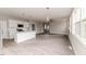 Open-concept living space with sleek floors, fireplace, and modern lighting at 117 Knight Rd Rd, Broadway, NC 27505