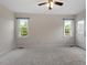 Bedroom featuring neutral carpet and an exterior door at 1228 Shakentown St, Knightdale, NC 27545
