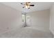 Bedroom with a ceiling fan and carpet flooring at 1228 Shakentown St, Knightdale, NC 27545