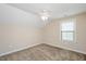 Comfortable bedroom with ceiling fan and natural light at 125 Greenway Landing Lndg, Chapel Hill, NC 27516