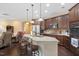 Gourmet kitchen with island, bar seating, and stainless steel appliances at 125 Greenway Landing Lndg, Chapel Hill, NC 27516