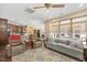 Open-concept living room with plush seating, hardwood floors, and plenty of natural light at 125 Greenway Landing Lndg, Chapel Hill, NC 27516