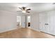 Bedroom features hardwood floors, a ceiling fan, and a closet at 1301 King Cross Ct, Raleigh, NC 27614