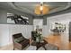 Comfortable living room shows neutral decor, light hardwood flooring, and an open concept floorplan at 1301 King Cross Ct, Raleigh, NC 27614