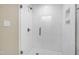 Contemporary bathroom featuring a frameless glass shower with white tiling at 1301 King Cross Ct, Raleigh, NC 27614