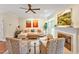 Well-lit living room with a fireplace, comfortable seating, and stylish decor providing a cozy atmosphere at 14 Marigold Pl, Durham, NC 27705