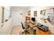 Functional home office with desk, shelving, and ample natural light for a productive workspace at 14 Marigold Pl, Durham, NC 27705