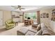 Cozy home office featuring a desk, couch, and built-in storage for optimal productivity at 14 Marigold Pl, Durham, NC 27705