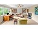 Comfortable home office with built-in bookshelves, ample seating, and a large bright window at 14 Marigold Pl, Durham, NC 27705