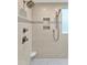 Contemporary shower design with mosaic tile accents, built-in niches, and dual showerheads at 14 Marigold Pl, Durham, NC 27705
