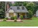 Charming home with well-maintained landscaping, a front porch, and inviting curb appeal at 1426 Cedar Branch Ct, Wake Forest, NC 27587