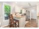 Cozy kitchen with granite countertops, stainless steel appliances, and ample natural light at 1426 Cedar Branch Ct, Wake Forest, NC 27587