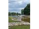 View of the lake from the community lakeside park and boat dock at 144 Shawnee Dr, Louisburg, NC 27549