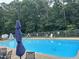 Large community pool with multiple chair sets for residents at 144 Shawnee Dr, Louisburg, NC 27549