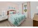 Comfortable bedroom featuring a cozy bed, natural light, and calming pastel decor at 148 Vaughan Farms Drive Dr, Angier, NC 27501