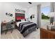 Nicely decorated bedroom featuring a desk, sporty decor, and a window with natural light at 148 Vaughan Farms Drive Dr, Angier, NC 27501