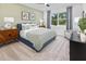 Comfortable main bedroom with a large window, soothing colors, and stylish furniture for a relaxing retreat at 148 Vaughan Farms Drive Dr, Angier, NC 27501