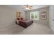 Comfortable bedroom featuring a ceiling fan and a window with natural light at 158 Pineland Cir, Raleigh, NC 27606