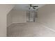 Spacious bedroom with neutral carpeting featuring multiple closets and access to other rooms at 158 Pineland Cir, Raleigh, NC 27606
