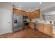Well-lit kitchen featuring stainless steel appliances and ample cabinet space at 158 Pineland Cir, Raleigh, NC 27606