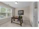 This office features natural light, a writing desk, and neutral carpeting at 158 Pineland Cir, Raleigh, NC 27606