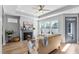 Inviting living room with a fireplace and plenty of natural light at 1727 Pinecliff Ct, Fuquay Varina, NC 27526