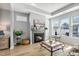 Bright living room showcasing a fireplace and stylish decor at 1727 Pinecliff Ct, Fuquay Varina, NC 27526