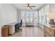 Functional home office with ample natural light and modern furnishings at 1727 Pinecliff Ct, Fuquay Varina, NC 27526