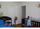 bedroom featuring beds, and wall decor, creating a playful atmosphere at 1809 S Garnett Ext, Henderson, NC 27536