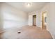 Bedroom featuring neutral walls, carpet, and an open closet doorway at 2001 October Dr, Durham, NC 27703