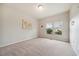 Bedroom with carpet, window, and natural light at 2001 October Dr, Durham, NC 27703