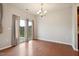 Bright dining area with hardwood floors and sliding glass doors leading to the backyard at 2001 October Dr, Durham, NC 27703