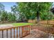 Relax on your wooden deck, that opens to the large backyard and trees at 205 Forest Hill Ave, Rocky Mount, NC 27804