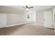 Bright bedroom features neutral paint and carpet at 205 Forest Hill Ave, Rocky Mount, NC 27804