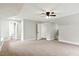 Bright bedroom featuring open doors to a bathroom at 205 Forest Hill Ave, Rocky Mount, NC 27804