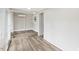 Bedroom includes sleek, new flooring, an air conditioning unit, and natural light at 205 Forest Hill Ave, Rocky Mount, NC 27804
