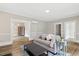 Bright living room with hardwood floors, neutral paint, and modern decor at 205 Forest Hill Ave, Rocky Mount, NC 27804
