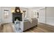 Cozy living room featuring hardwood floors, a decorative fireplace, and neutral decor at 205 Forest Hill Ave, Rocky Mount, NC 27804