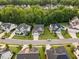 Beautiful two-story home with a manicured lawn and a tree-lined backyard in a desirable neighborhood at 2083 Amalfi Pl, Apex, NC 27502
