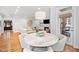 Bright breakfast nook adjacent to living room featuring a marble table at 2083 Amalfi Pl, Apex, NC 27502